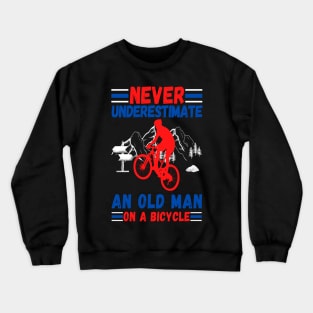 never underestimate an old man on a bicycle Crewneck Sweatshirt